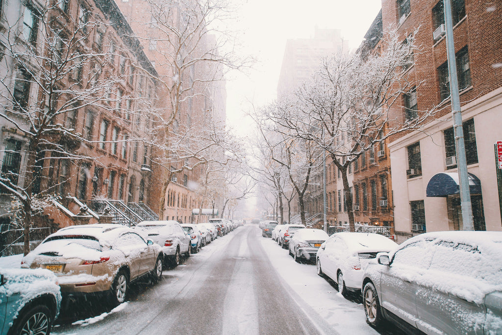 Snow falling on a city street