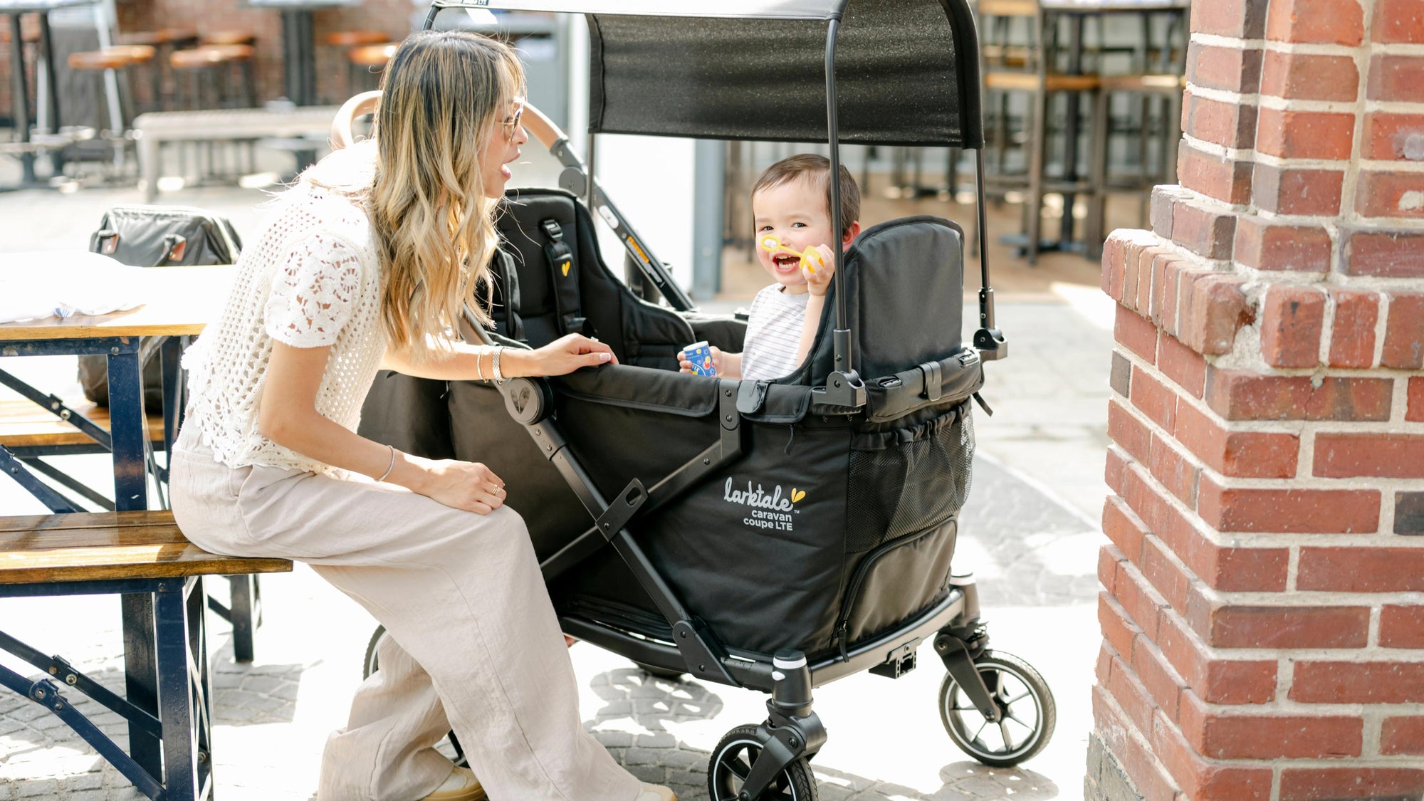 mom and baby with caravan coupe LTE