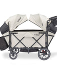 larktale caravan v3 stroller wagon in newport taupe side view with reclined seats