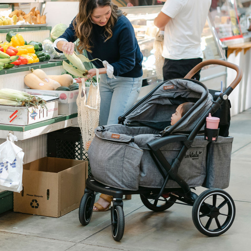 mother and child shop in the farmer's market using the sprout in single mode