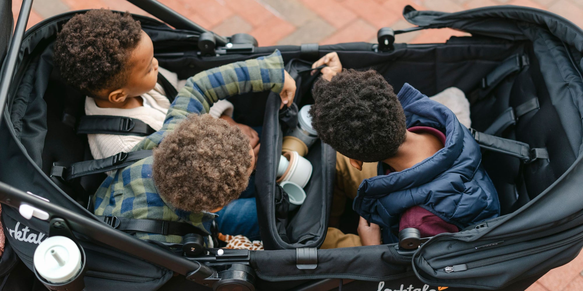 three children in the caravan coupe quad