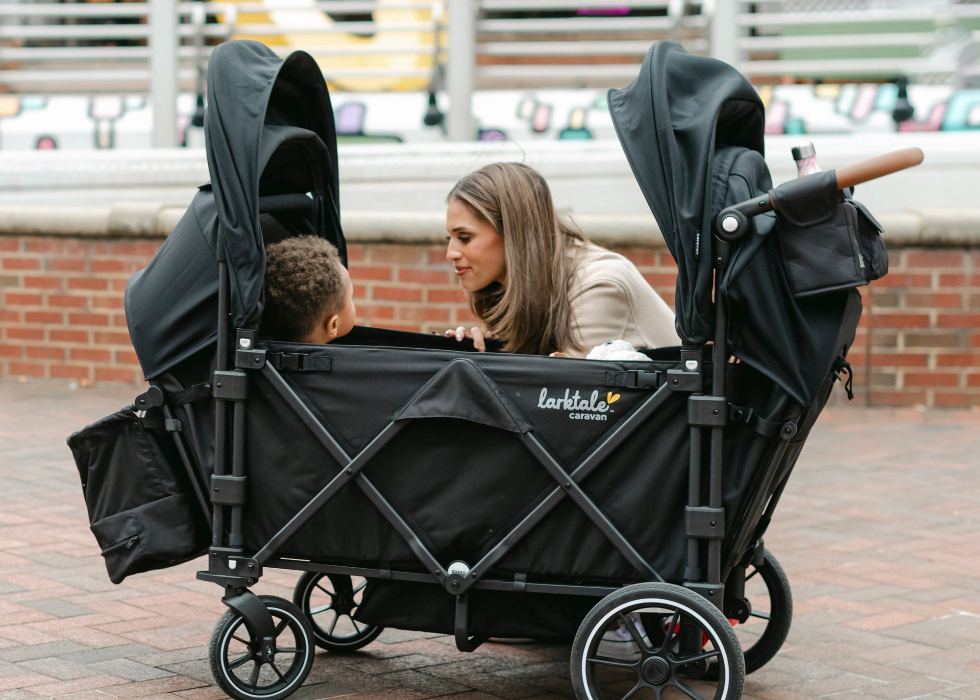 parent and child using caravan V3 in black