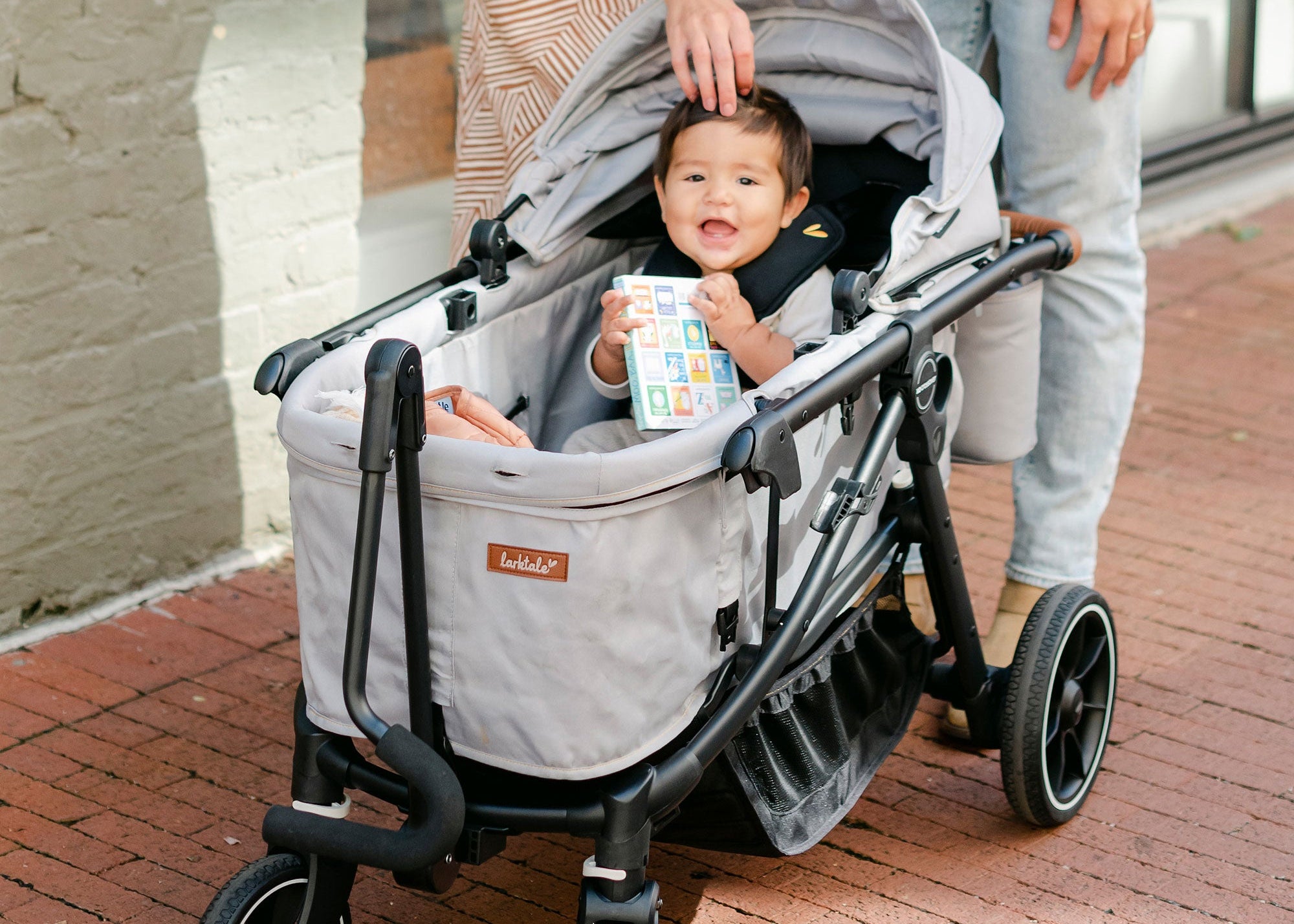 baby in grey crossover in wagon mode
