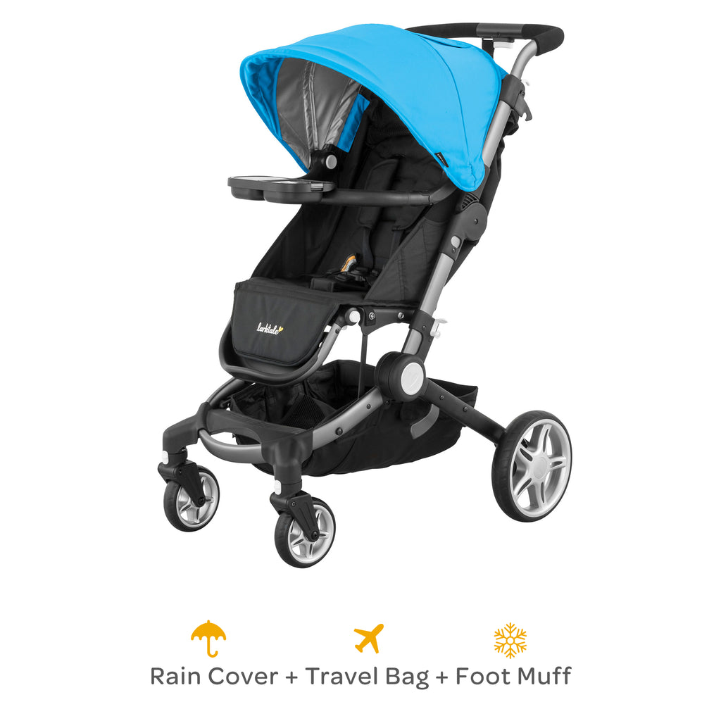 coast stroller in blue with rain cover, travel bag and foot muff included