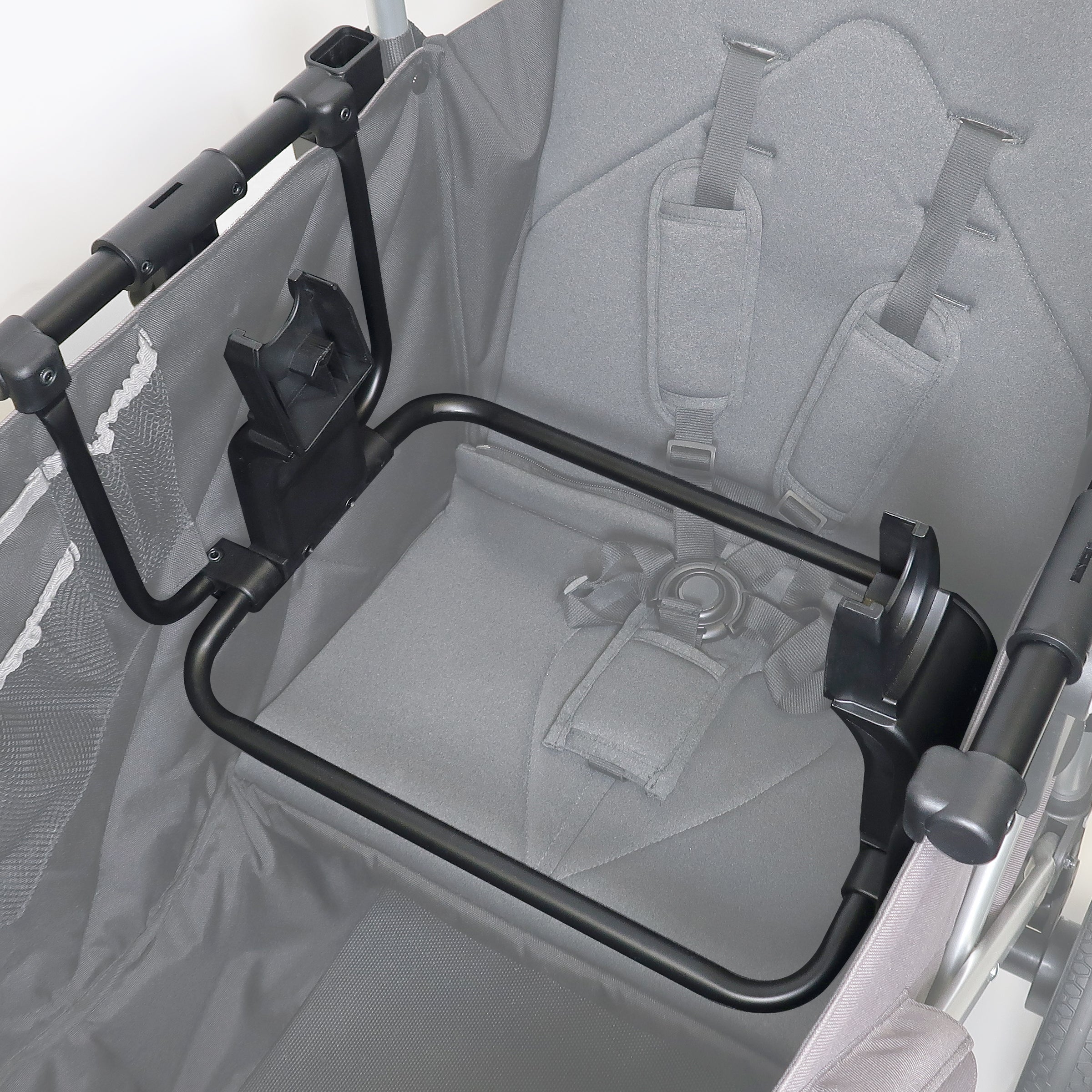 car seat adapter for maxi cosi, nuna and clek installed on the caravan stroller wagon